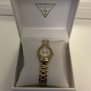 Gold tone Guess watch
